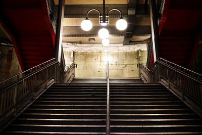 Low angle view of illuminated subway station