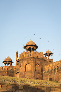 Low angle view of historic building against clear sky