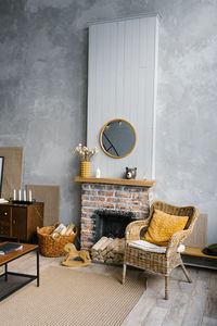 A scandinavian living room in the grey and gold colors of 20213. the interior of a country house