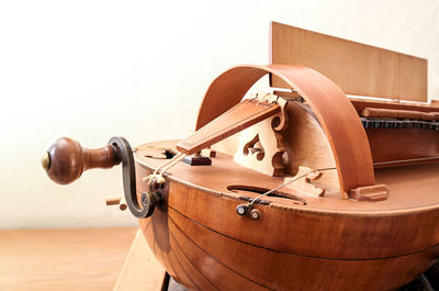 Close-up of camera on wooden table