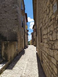 Narrow alley along buildings