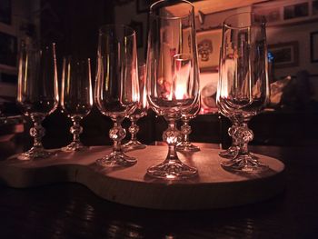 Close-up of wine glasses on table