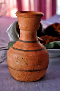 Close-up of vase on table