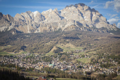 Aerial view of townscape and mountains