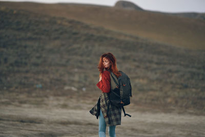 Full length of woman standing outdoors