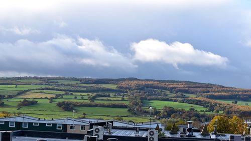 Scenic view of agricultural field against sky