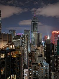 Illuminated buildings in city at night