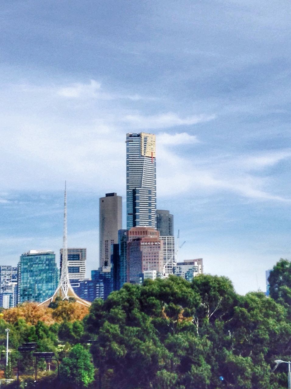 building exterior, architecture, built structure, city, skyscraper, modern, sky, tree, office building, tall - high, tower, cloud - sky, growth, building, cityscape, cloud, urban skyline, day, tall, outdoors