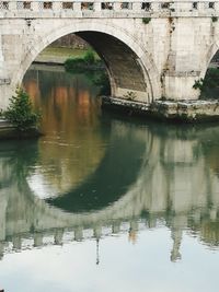 Arch bridge over river