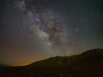 Scenic view of star field against sky at night