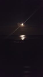 Scenic view of sea against sky at dusk