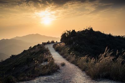 Scenic view of landscape against sky during sunset