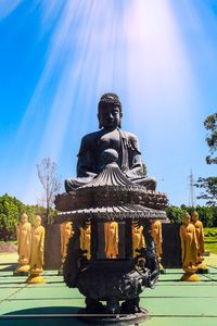 Statue of temple against sky