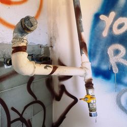 High angle view of pipes on wall