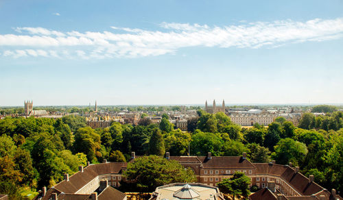 High angle view of trees and buildings against sky