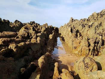 Panoramic view of beach against sky