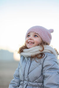 Portrait of smiling girl in snow