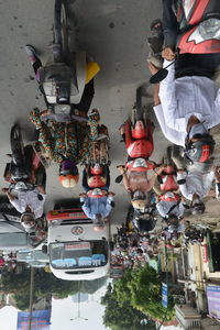 People riding motorcycle on city street