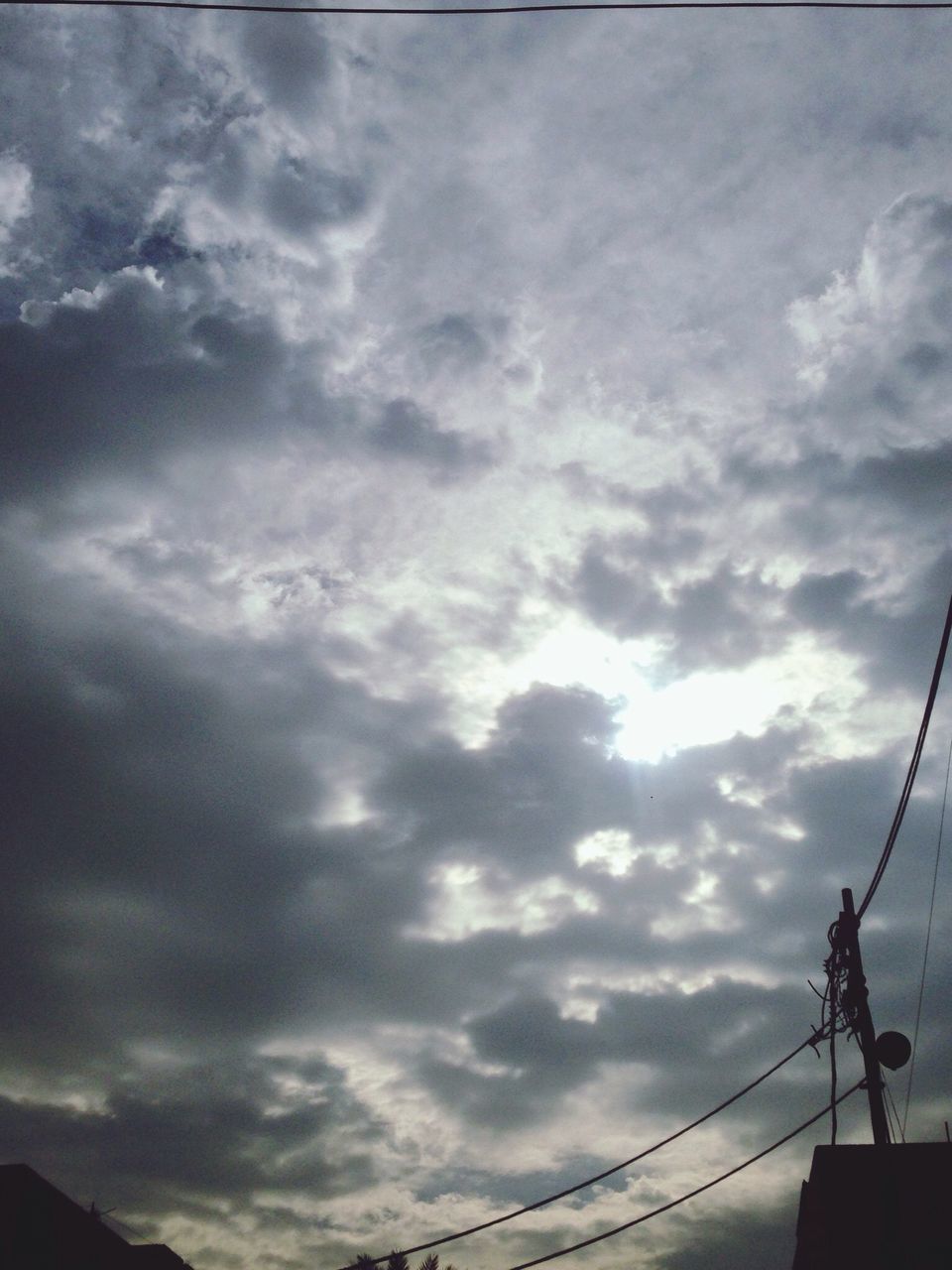 sky, low angle view, cloud - sky, power line, cloudy, electricity pylon, connection, electricity, cable, silhouette, cloud, power supply, beauty in nature, nature, tranquility, scenics, sunset, outdoors, no people, weather