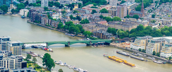 High angle view of river amidst buildings in city