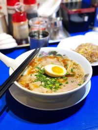 Close-up of soup served on table