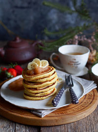 Close-up of cake and coffee on table