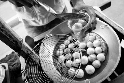 Close-up of worker at food stall