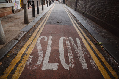 High angle view of text on road