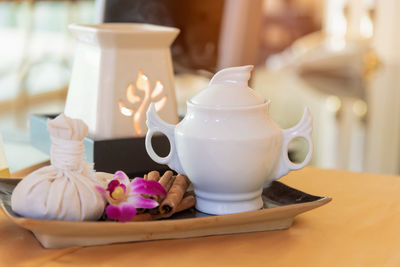 Close-up of coffee cup on table