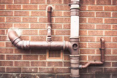 Pipe on brick wall