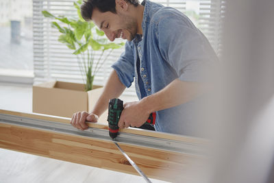 Man working on wood