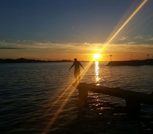 Scenic view of sea at sunset