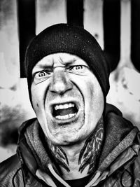 Close-up portrait of man wearing mask