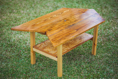 High angle view of empty chair on table