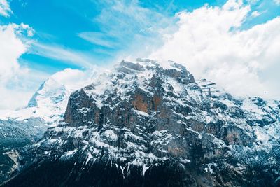 Scenic view of snowcapped mountain against sky