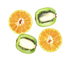 Close-up of oranges against white background