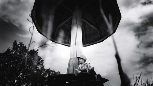 Low angle view of statue against sky