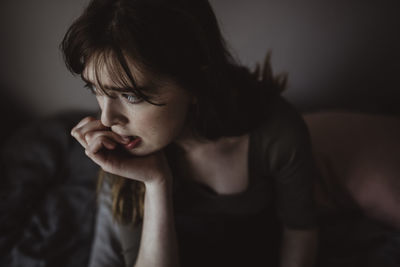 High angle view of sad woman looking away