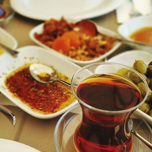 Close-up of food and drink served on table