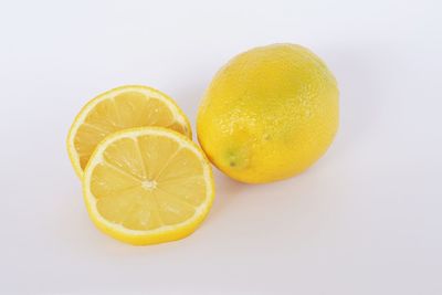 Close-up of fruits against white background