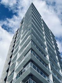 Low angle view of skyscraper against sky