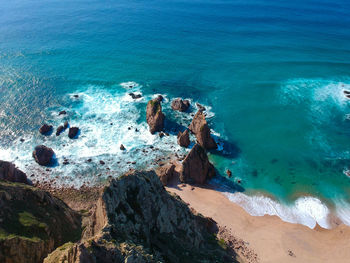 High angle view of rocks on beach