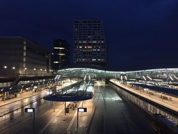 Illuminated buildings in city at night