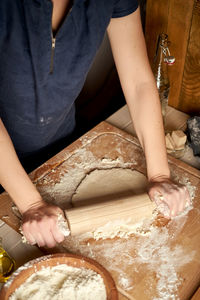 Midsection of woman preparing food