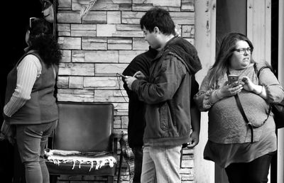 Group of people sitting outdoors
