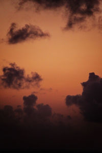 Low angle view of dramatic sky during sunset