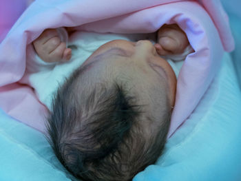 Close-up of newborn baby girl
