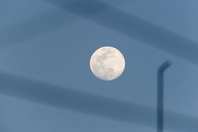 Low angle view of moon against sky at night