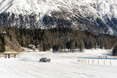 Classic vintage car on the frozen lake of saint moritz in a race