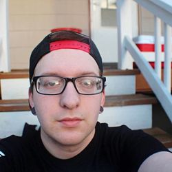 Portrait of young man wearing eyeglasses